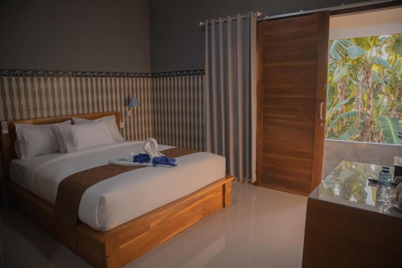 Prasi Sunrise Homestay Toyapakeh Exterior photo